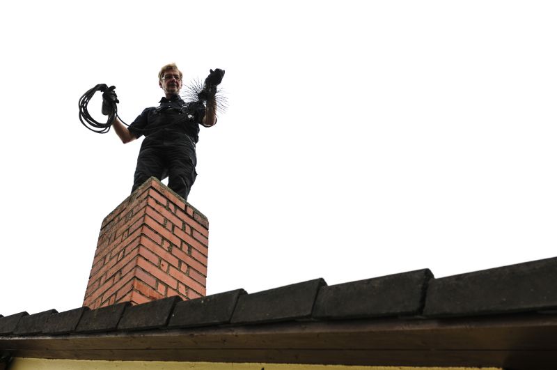 Local Chimney Cleaning pros at work